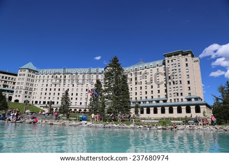 LAKE LOUISE, CANADA - JULY 27: View of the famous Fairmont Chateau Lake Louise Hotel on July 27, 2014. Lake Louise is the second most-visited destination in the Banff National Park.