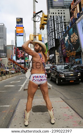 NEW YORK - DECEMBER 18 Famous Naked Cowboy posing at the Times Square in Manhattan on December 18, 2014