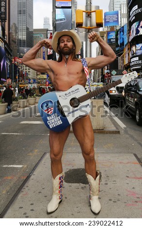 NEW YORK - DECEMBER 18 Famous Naked Cowboy posing at the Times Square in Manhattan on December 18, 2014