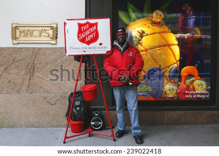NEW YORK - DECEMBER 18: Salvation Army soldier near Macy\'s on December 18, 2014 in midtown Manhattan. This Christian organization is known for its charity work, operating in 126 countries