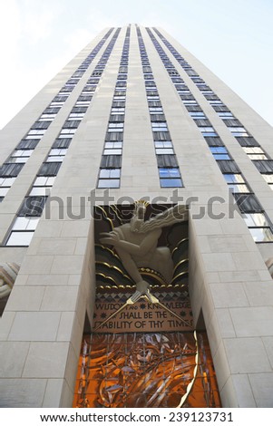 NEW YORK CITY - DECEMBER 18: Wisdom, an art deco frieze by Lee Lawrie over the entrance of GE Building at Rockefeller plaza on December 18, 2014