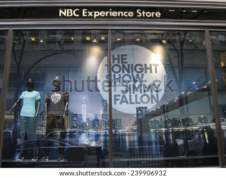 NEW YORK - DECEMBER 18: NBC Experience Store window display decorated with The Tonight Show with Jimmy Fallon logo in Rockefeller Center in Midtown Manhattan on December 18, 2014