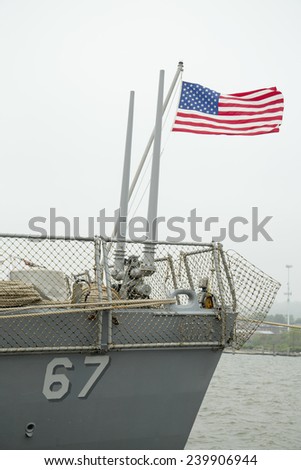 NEW YORK - MAY 22; American flag at the USS Cole guided missile destroyer of the United States Navy during Fleet Week 2014 on May 22, 2014 in New York