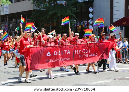 NEW YORK - June 29, 2014:Delta Airlines LGBT Pride Parade participants in New York City on June 29, 2014. LGBT pride march takes place during pride week and is the culmination of week long festivities