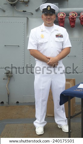 NEW YORK - MAY 22: Unidentified US Navy officer on the deck of US Navy guided-missile destroyer USS Cole during Fleet Week 2014 on May 22, 2014 in New York