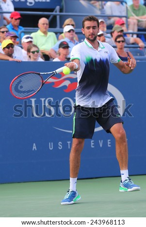 NEW YORK -SEPTEMBER 2, 2014: US Open 2014 champion Marin Cilic from Croatia during US Open 2014 round 4 match against Gilles Simon at Billie Jean King National Tennis Center in New York