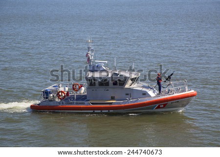 NEW YORK - MAY 25, 2014:  US Coast Guard boat providing security Fleet Week 2014 in New York Harbor