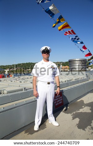 NEW YORK - MAY 25: Unidentified US Navy officer on the deck of US Navy guided-missile destroyer USS Cole during Fleet Week 2014 in New York