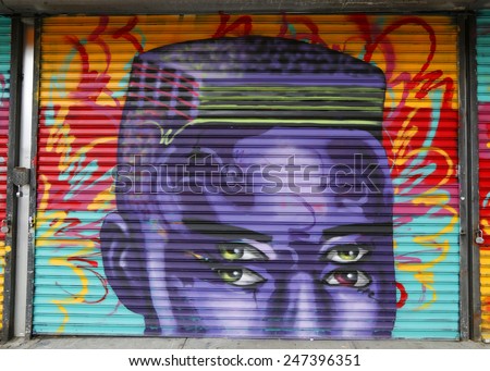 NEW YORK - NOVEMBER 16, 2014: Mural art at Bowery in Manhattan. A mural is any piece of artwork painted or applied directly on a wall, ceiling or other large permanent surface