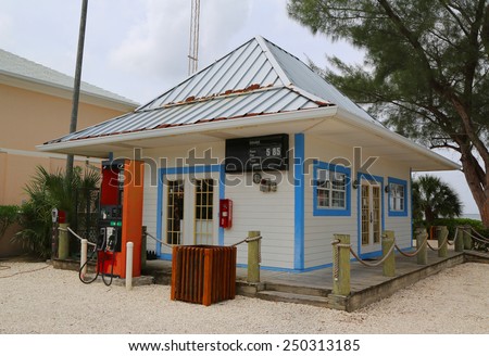 GRAND CAYMAN, CAYMAN ISLANDS - JUNE 11, 2014: Gas station at Cayman Kai area at Grand Cayman. Grand Cayman is the largest of the three Cayman Islands and the location of the capital George Town