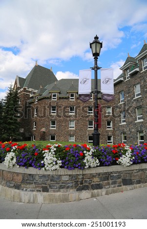 BANFF, CANADA - JULY 26, 2014: Banff Springs Hotel in the Canadian Rockies. The Banff Springs Hotel was built during the 19th century in Scottish Baronial style