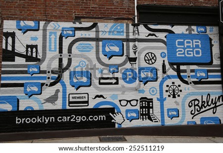 NEW YORK - NOVEMBER 13, 2014: Car2Go mural  in Red Hook section of Brooklyn. A mural is any piece of artwork painted or applied directly on a wall, ceiling or other large permanent surface
