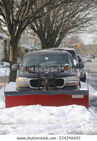 BROOKLYN, NEW YORK - FEBRUARY 19, 2015: Snow plow truck in Brooklyn, NY during record breaking winter