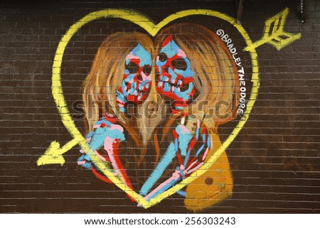 NEW YORK - FEBRUARY 26, 2015: Mural art in Little Italy in Manhattan. A mural is any piece of artwork painted or applied directly on a wall, ceiling or other large permanent surface