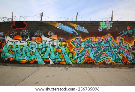 NEW YORK - DECEMBER 4, 2014: Graffiti art at East Williamsburg in Brooklyn. Outdoor art gallery known as the Bushwick Collective has most diverse collection of street art in Brooklyn