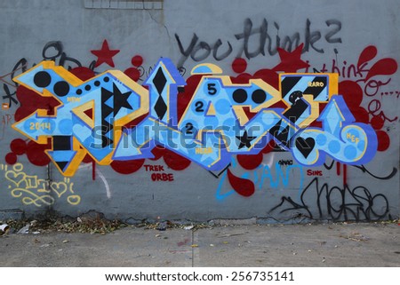 NEW YORK - NOVEMBER 20, 2014: Graffiti art at East Williamsburg in Brooklyn.Outdoor art gallery known as the Bushwick Collective has most diverse collection of street art in Brooklyn