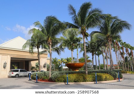GRAND CAYMAN - JUNE 12, 2014: The Ritz-Carlton Grand Cayman luxury resort located on the Seven Miles Beach. Seven Mile Beach is the most populated area for hotels and resorts on the island