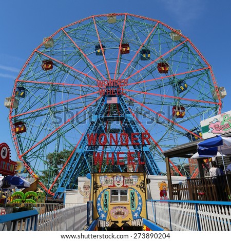 BROOKLYN, NEW YORK - MAY 17, 2014: Wonder Wheel at the Coney Island amusement park.  Deno\'s Wonder Wheel a hundred and fifty foot eccentric Ferris wheel. This wheel was built in 1920