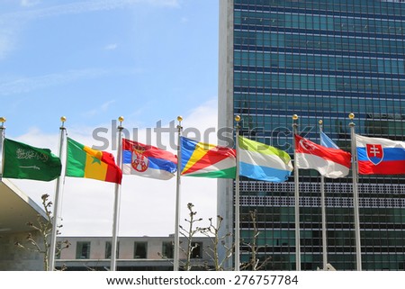NEW YORK CITY - APRIL 30, 2015: International Flags in the front of United Nations Headquarter in New York