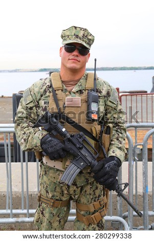 NEW YORK - MAY 20, 2015:  Unidentified US Marine providing security during Fleet Week 2015 in New York