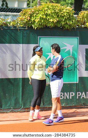 PARIS, FRANCE- MAY 24, 2015: Nineteen times Grand Slam champion Serena Willams practices for Roland Garros 2015 with her coach Patrick Mouratoglou in Paris, France