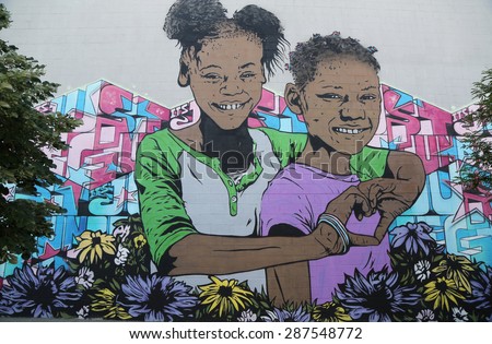 NEW YORK - JUNE 6, 2015: Mural art at East Williamsburg in Brooklyn.Outdoor art gallery known as the Bushwick Collective has most diverse collection of street art in Brooklyn