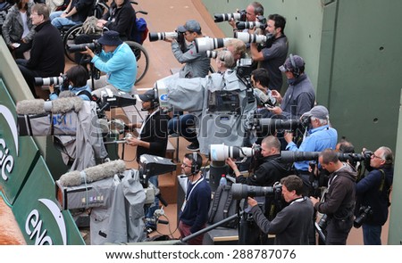 PARIS, FRANCE- MAY 28, 2015: Professional sport photographers during match at Roland Garros 2015 in Paris, France