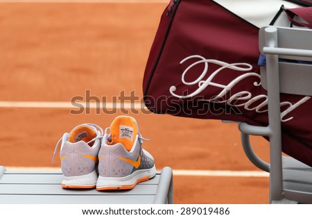 PARIS, FRANCE- MAY 29, 2015: Nike tennis shoes and Head tennis bag at Roland Garros 2015 in Paris, France