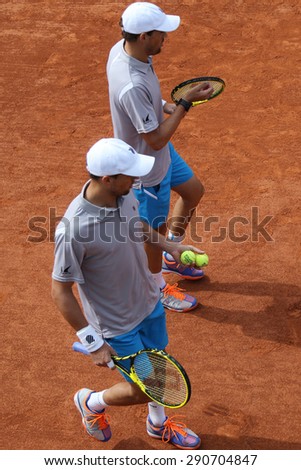 PARIS, FRANCE- MAY 29, 2015: Grand Slam champions Mike and Bob Bryan of United States in action during second round match at Roland Garros 2015 in Paris, France