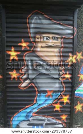 NEW YORK - JUNE 16, 2015: Mural art at Wellington Court in Astoria section in Queens. A mural is any piece of artwork painted or applied directly on a wall, ceiling or other large permanent surface