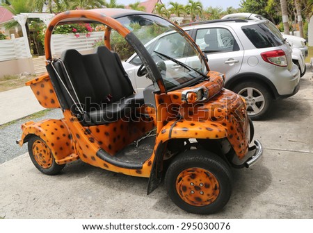 ST BARTHS, FRENCH WEST INDIES - JUNE 13, 2015: Custom design GEM E2 electrical car at St Barths. GEM is a US manufacturer in the low-speed vehicle category, producing electric vehicles since 1998
