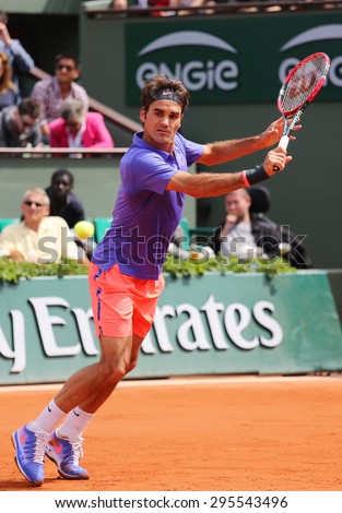 PARIS, FRANCE- MAY 29, 2015: Seventeen times Grand Slam champion Roger Federer in action during his second round match at Roland Garros 2015 in Paris, France