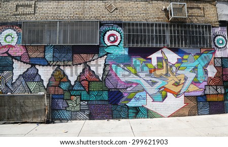NEW YORK - JULY 23, 2015: Mural art at East Williamsburg in Brooklyn.Outdoor art gallery known as the Bushwick Collective has most diverse collection of street art in Brooklyn