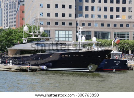 NEW YORK CITY - JULY 11, 2015: Mega yacht docked at the North Cove Marina at Battery Park in Manhattan