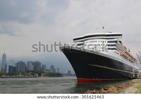 NEW YORK - JULY 30, 2015: Queen Mary 2 cruise ship docked at Brooklyn Cruise Terminal. Queen Mary 2 is Cunard s flagship