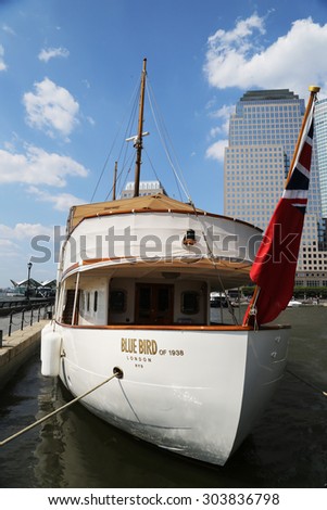 NEW YORK CITY - JULY 11, 2015: Historical Blue Bird of 1938 yacht docked at the North Cove Marina at Battery Park. This classic gentleman s yacht built in 1938 for Sir Malcolm Campbell