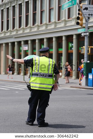 NEW YORK - AUGUST 8, 2015: NYPD Traffic Control Police Officer in Lower Manhattan