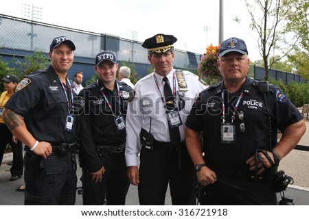 NEW YORK - SEPTEMBER 13, 2015: NYPD  police officers providing security at National Tennis Center during US Open 2015 finals in New York