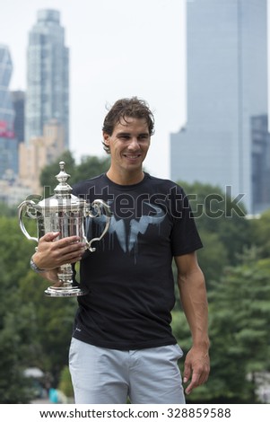 NEW YORK CITY - SEPTEMBER 10, 2013: US Open 2013 champion Rafael Nadal posing with US Open trophy in Central Park