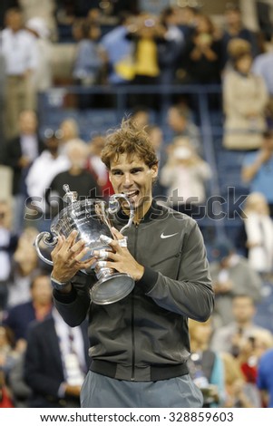 NEW YORK - SEPTEMBER 9, 2013:US Open 2013 champion Rafael Nadal holding US Open trophy during trophy presentation after his final match win against Novak Djokovic at National Tennis Center in New York