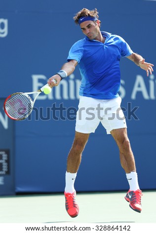 NEW YORK - AUGUST 27, 2013: Seventeen times Grand Slam champion Roger Federer in action during his first round match at US Open 2013 against Grega Zemlja at Billie Jean King National Tennis Center