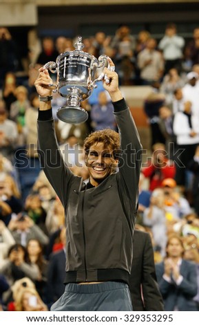 NEW YORK - SEPTEMBER 9, 2013: US Open 2013 champion Rafael Nadal holding US Open trophy during trophy presentation after his win against Novak Djokovic at National Tennis Center  in New York