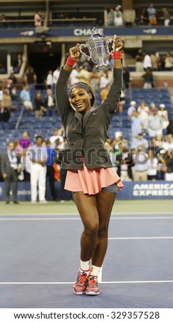 NEW YORK - SEPTEMBER 8, 2013:  US Open 2013 champion Serena Williams holding US Open trophy after win against Victoria Azarenka at Billie Jean King National Tennis Center