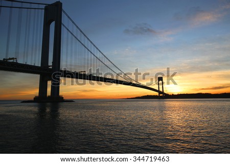 NEW YORK - NOVEMBER 27, 2015: Verrazano Bridge in New York. The Verrazano Bridge is a double-decked suspension bridge that connects the boroughs of Staten Island and Brooklyn