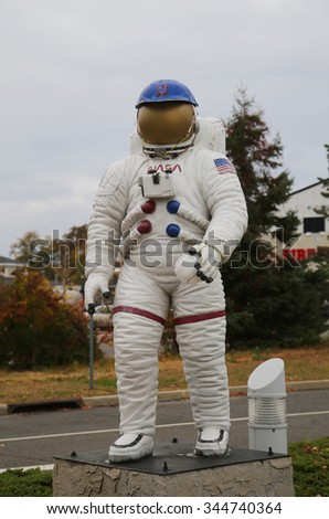 GARDEN CITY, NEW YORK - NOVEMBER 5, 2015: NASA space suit on display in the front of the Cradle of Aviation Museum in Garden City
