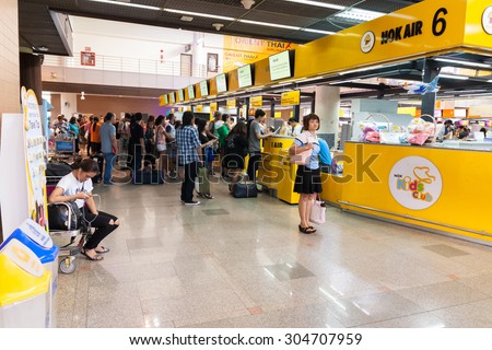 Bangkok - August 6: Don Muang Airport on August 6, 2015 the number of people waiting to board a flight documentation. Are available at Don Muang Airport in Bangkok, Thailand.