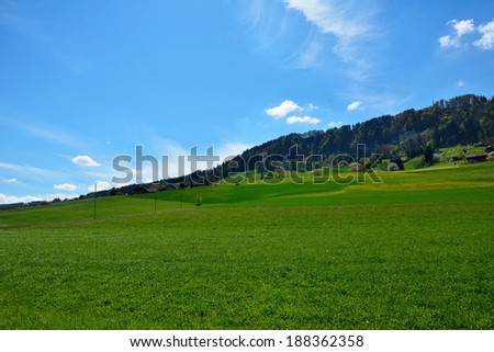 Swiss landscape countryside during spring season with blue sky