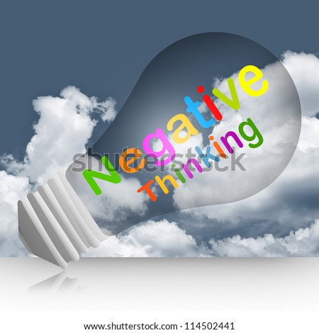 Colorful Negative Thinking Text Inside The Light Bulb For Business Concept in Dark Sky Background