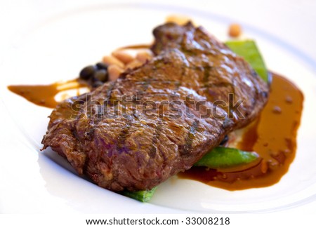 Sirloin strip Steak with green Beans ,vegetables and savory sauce