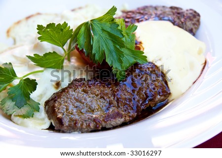 Sirloin strip Steak -entrecote- with vegetables and savory bechamel-sauce